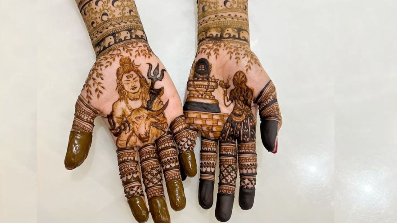 शिव-शक्ति पोर्ट्रेट डिजाइन इस बार की सबसे बड़ी पसंद शिव-शक्ति का पोर्ट्रेट है। हथेली के बीचों-बीच भगवान शिव और माता पार्वती की एक-दूसरे को निहारती हुई आकृति आपके हाथों को एक दिव्य रूप देती है। यह डिजाइन प्रेम और शक्ति के संतुलन को दर्शाता है।